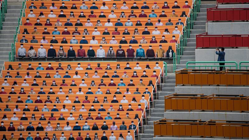 Supporters are printed on banners displayed at the SK Wyverns Baseball Park in Incheon, South Korea. Photograph: EPA