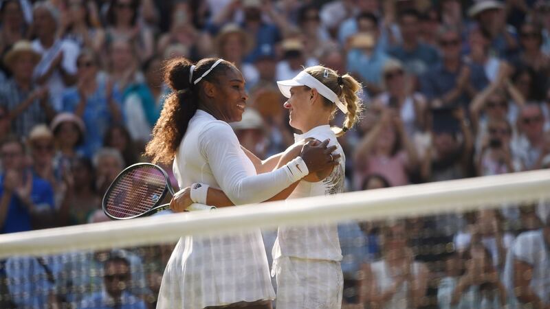 Serena Williams embraces Angelique Kerber after their women’s singles final at the 2018 Wimbledon Championships. Photograph:   Oli Scarff/AFP
