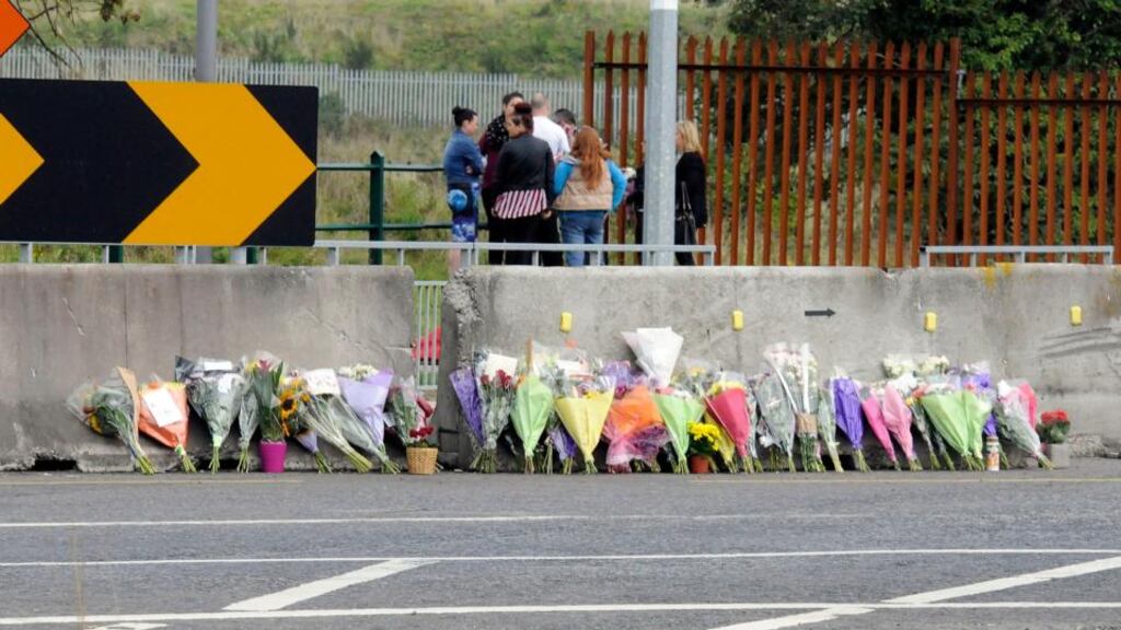 Floral tributes in Ballymun, Dublin, adjacent to the Ikea store, near where the body of missing Alzheimer’s patient Peggy Mangan was discovered on Saturday. Photograph: Dave Meehan
