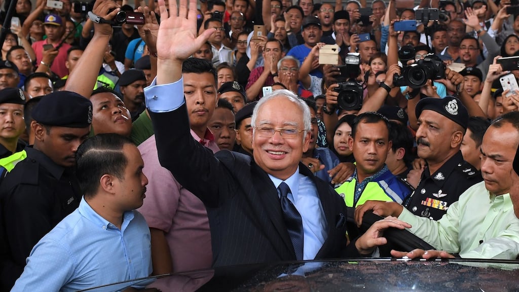 Malaysia’s former prime minister Najib Razak after a court appearance linked to the 1MDB scandal in 2018. Photograph: Mohd Rasfan/AFP via Getty Images