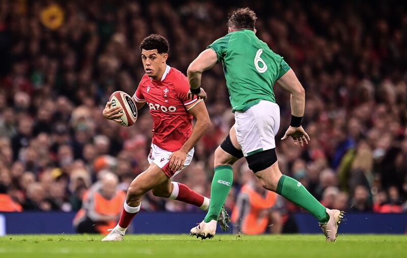 Wales’ Rio Dyer against Peter O’Mahony of Ireland. Photograph: Ashley Crowden/Inpho