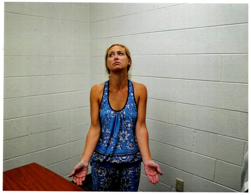 Exhibit 116: Molly Martens at police station