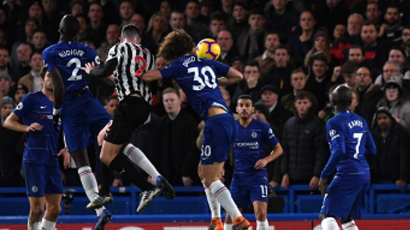 Ciaran Clark headed in Newcastle’s goal at Stamford Bridge. Photograph: EPA