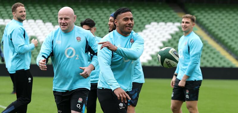 Manu Tuilagi passes the ball during the England captain's run at the Aviva Stadium. Photograph: David Rogers/Getty Images