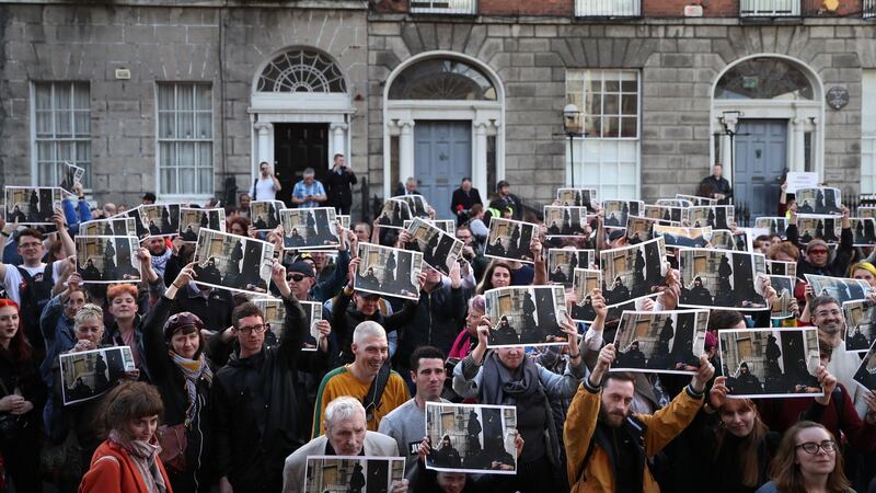 People take part in a protest outside 34 North Frederick St in Dublin’s city centre. Photograph: Brian Lawless/PA Wire