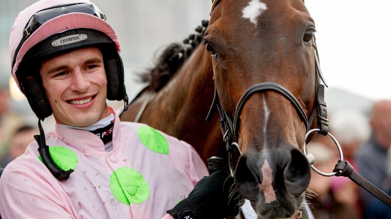 Jackey Danny Mullins celebrates after Riven Light’s win in the Colm Quinn BMW Mile Handicap on day two of the Galway Racing Festival at Ballybrit. Photograph: James Crombie/Inpho