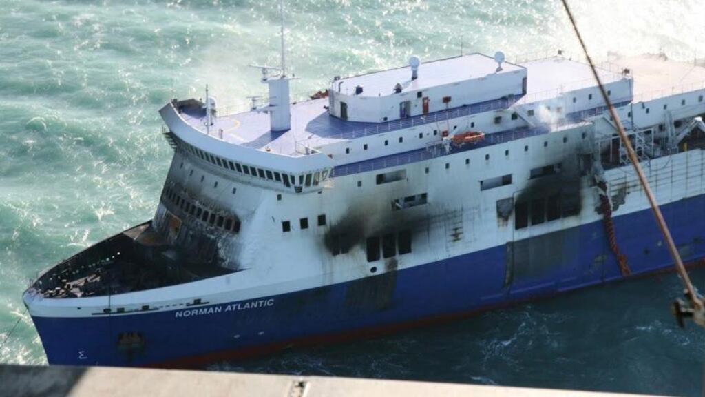The Norman Atlantic ferry is towed to the port of Brindisi, Italy. The vessel, which was being operated by a Greek shipping line, was disabled when the fire erupted near the Greek island of Corfu. Photograph: Renato Ingenito/EPA