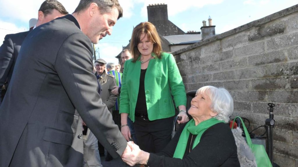 Maggie Cantwell, wife of the late Manchester United star Noel Cantwell, and her daughter Kate talking with Roy Keane at the opening of Noel Cantwell Walk in the Mardyke area of Cork City. Photograph: Provision