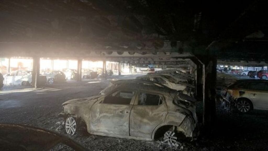 The aftermath of a large fire in the multi-storey parking facility of the Douglas Village Shopping Centre in Cork. Photograph: Cork City Fire Brigade/PA Wire