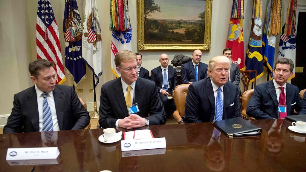 Mission to Mars: Donald Trump in a meeting with (far left) Tesla founder and chief Elon Musk. Photograph: Nicholas Kamm/AFP/Getty Images