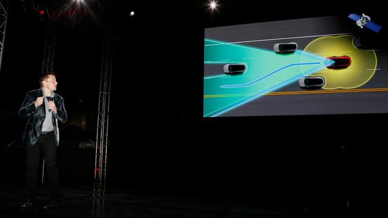 New all-wheel-drive versions of the Tesla Model S are lined up for test drives in Hawthorne, California