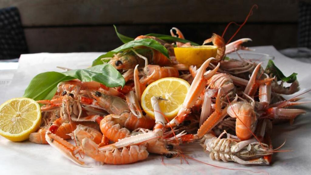 Poached Dublin Bay prawns with wild garlic butter