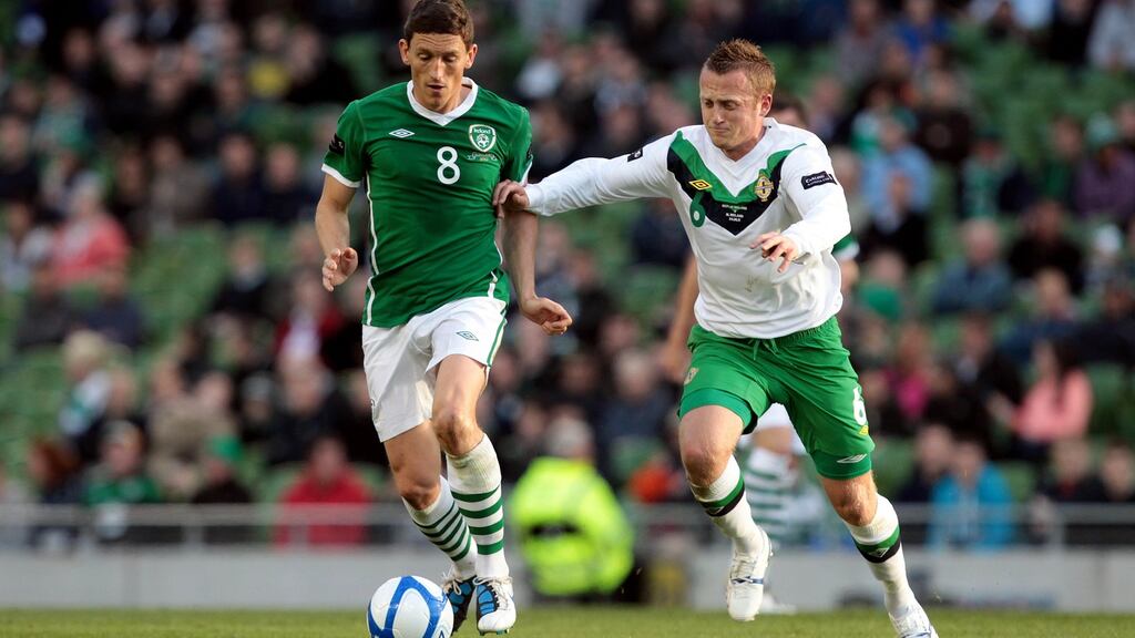 Republic of Ireland’s Keith Andrews and Sammy Clingan of Northern Ireland during the sides’ last encounter in May 2011, which the Republic won 5-0. Photograph: Cathal Noonan/Inpho