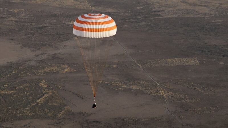 A parachute carrying the Soyuz MS-04 capsule returning from the International Space Station (ISS) with crew members. Photograph: Sergei Ilnitsky/EPA
