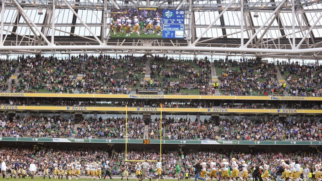Notre Dame players celebrate after the final whistle of the game against Navy at the Aviva stadium in September, 2012. Photograph: Barry Cronin/Getty Images