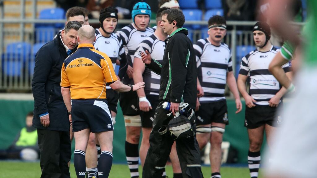 Gonzaga’s team doctor, Paul Meagher, remonstrates with referee Gary Glennon following an incident which saw Fiachra Keane suffer a head injury. Photo: Gary Carr/Inpho