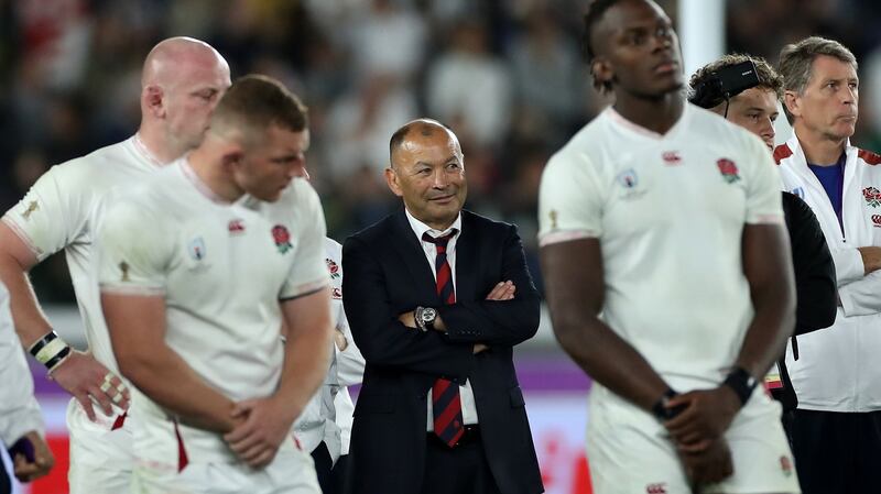 England coach Eddie Jones and some players looks on after their defeat in the World Cup final to South Africa. Photograph: David Rogers/Getty Images