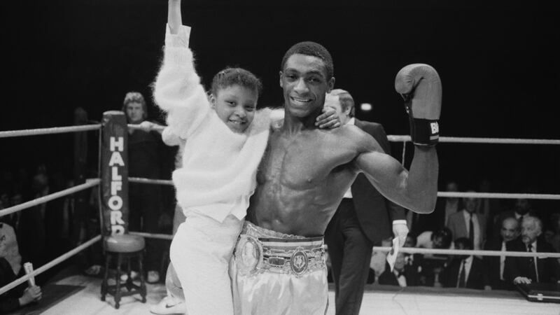 British boxer Herol Graham with his daughter Natasha after beating Jimmy Price in 1985. His pro career: 48 wins, six defeats and enough blows to the head to wreak havoc on the middleweight contender’s brain. Photograph: Getty Images