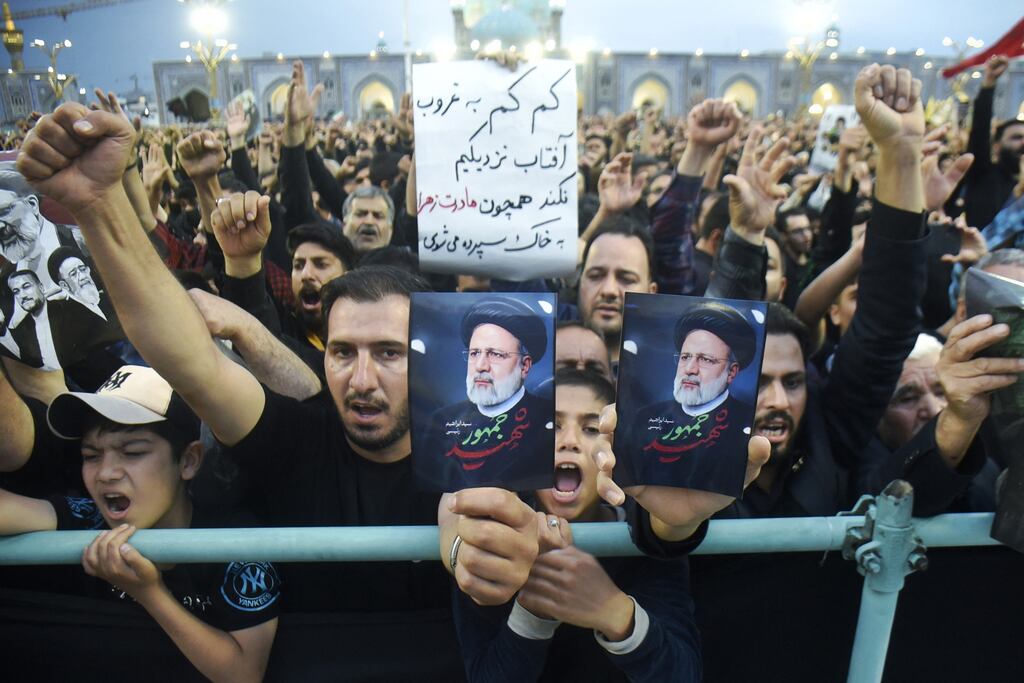 Iranians mourn Ebrahim Raisi at the Imam Reza shrine during the funeral ceremony in the city of Mashhad. Photograph: Hossein Moameri/Getty Images
