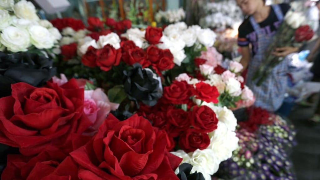 Preparing roses for sale ahead of Valentine’s Day  in Bangkok, Thailand, on February 12th, 2015. Photograph: Narong Sangnak/EPA