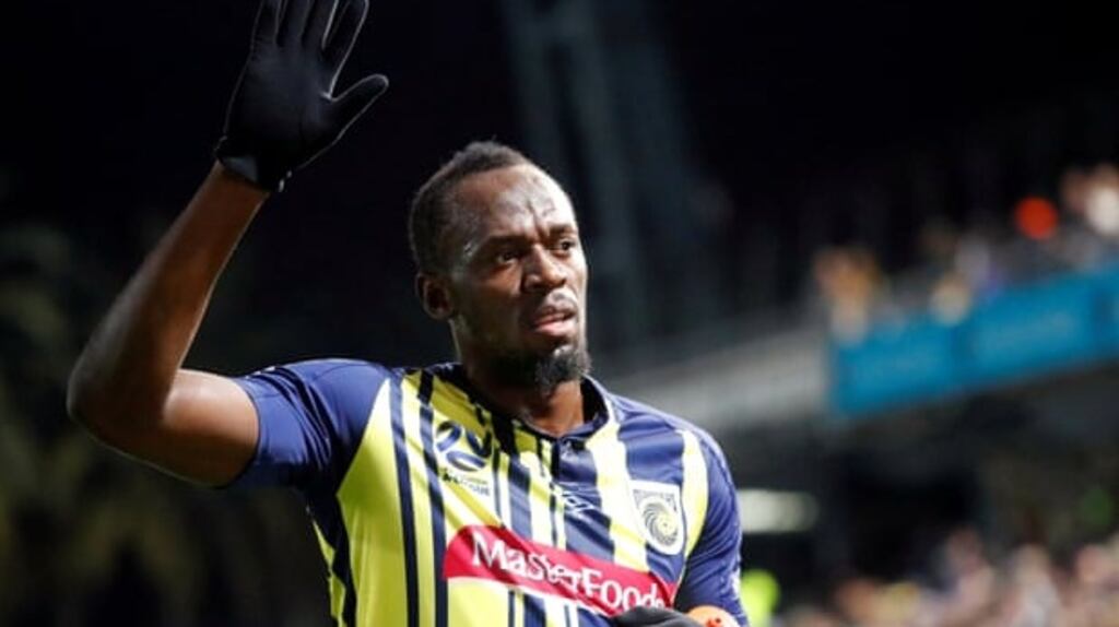 Usain Bolt has given up on his dream to play professional football. Photograph: David Gray/Reuters