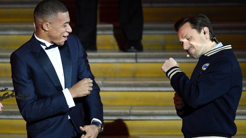 French DJ and co-host Martin Solveig (R) with Kylian Mbappe during the Ballon d’Or ceremony in Paris. Photograph: Franck Fife/AFP/Getty