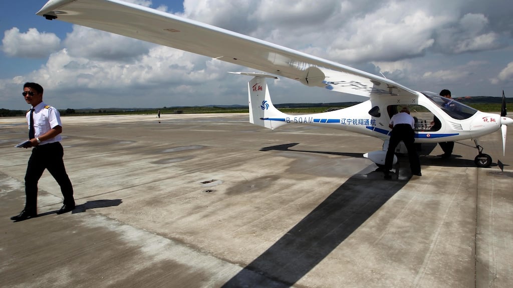 China’s first domestically-developed electrically-powered light aircraft (Rui Xiang RX1E). The two-seater airplane is made of a carbon-fibre composite material and is powered by an electric motor running on lithium batteries, with each recharge using only 10KW at a cost of about 80 cent. Photograph: Chinafotopress/Getty Images
