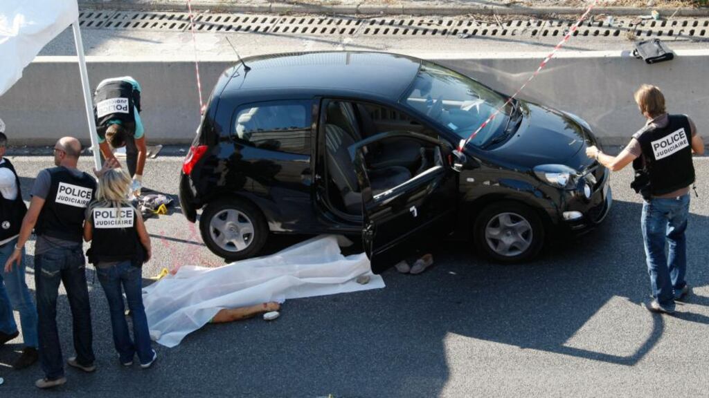 Police attend the scene of Adrien Anigo’s murder in Marseille on Thursday, the city’s 15th fatality in gang warfare this year. Photograph: Claude Paris/AP Photo