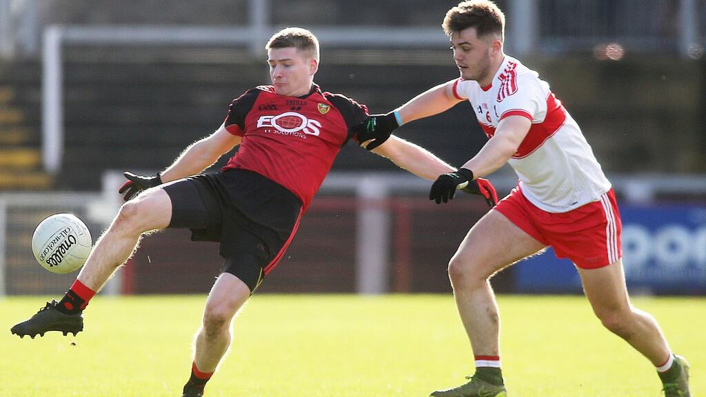 Down’s Conor Maginn and Derry’s Conor Nevin in action in the National Football League Division Two. Photograph: Lorcan Doherty/Presseye/Inpho