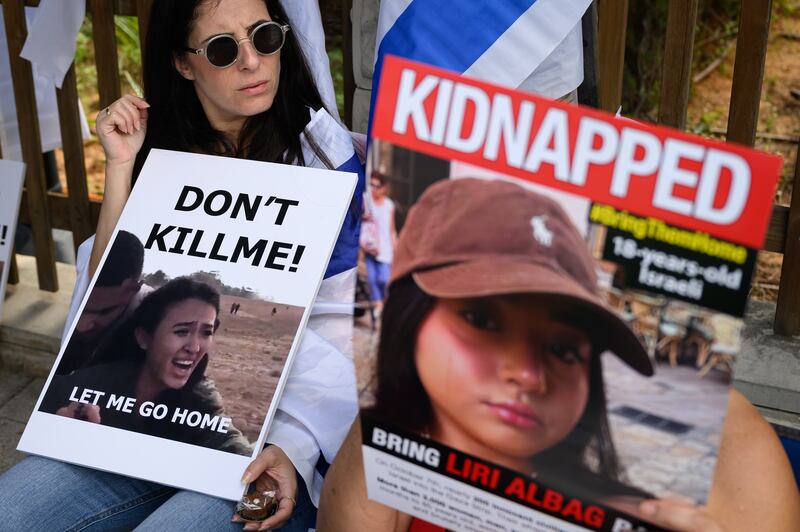 Family and friends of people taken hostage by Hamas during their October 7th attack protest outside the Kirya military base in Tel Aviv on Wednesday. Photograph: Leon Neal/Getty Images