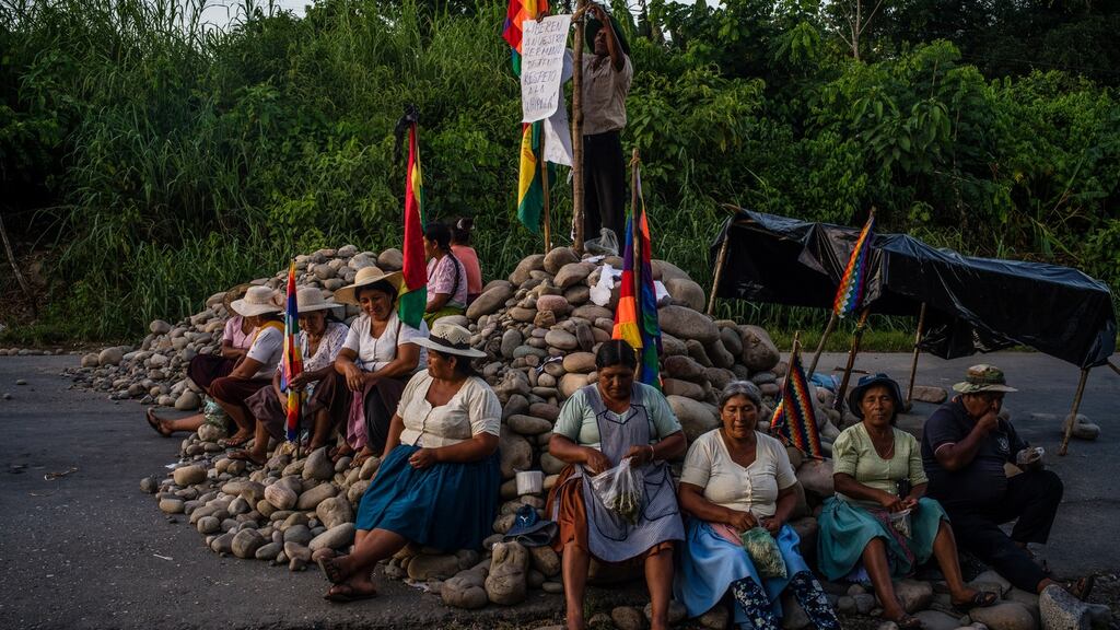 Protesters at a road block on the highway from Cochabamba to Santa Cruz in Bolivia. It is in the coca-growing region where former Bolivian president Evo Morales got his political start. Photograph: Federico Rios/The New York Times