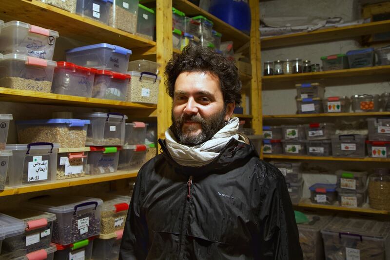 Serge Harfouche in a storage room lined with boxes containing more than 300 varieties of seeds native to Iraq, Syria and Lebanon. Photograph: Hannah McCarthy
