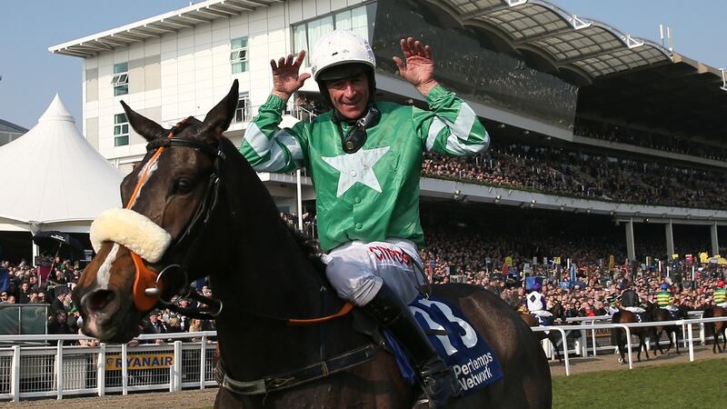 Davy Russell celebrates winning the 2.10 Pertemps Network Final on Mall Dini at Cheltenham. Photo: Andrew Boyers/Reuters