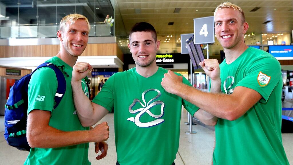 Irish hockey players Conor Harte and David Harte with Boxer Joe Ward ahead of the 2016 Rio Olympics. Photo: James Crombie/Inpho