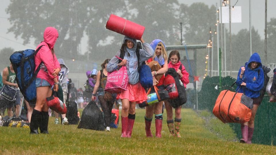 Rain pours down on campers arriving to Punchestown. Photograph: Alan Betson/The Irish Times