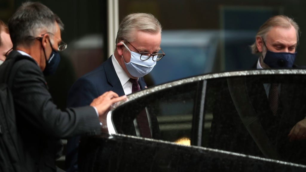 British cabinet minister Michael Gove, (centre), leaves the third meeting of the EU-UK joint committee at EU headquarters in Brussels yesterday. Photograph: Francisco Seco/AP
