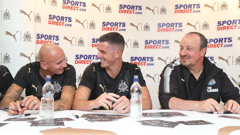 Ireland international Ciarán Clark shares a joke with Jonjo Shelvey as Newcastle manager Rafa Benítez looks on during a visit to Dublin. Photograph: Photocall
