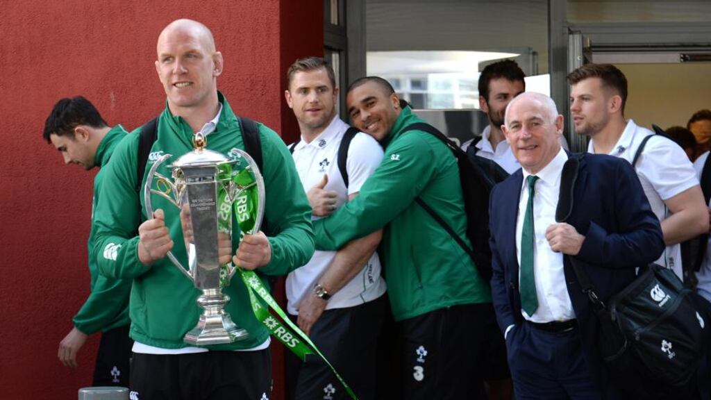 Irish captain Paul O’Connell holding the RBS Six Nations trophy as the Irish rugby team arrived back at Dublin Airport on Sunday. Photograph: Cyril Byrne