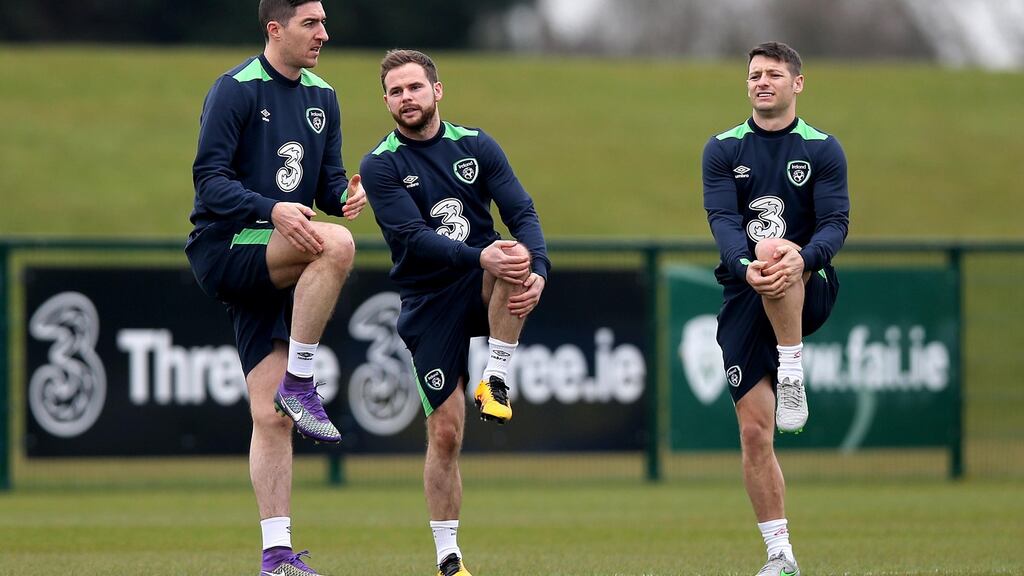 Alan Judge (centre) with Stephen Ward and Wes Hoolahan at Ireland squad training. Photograph: Donall Farmer/Inpho
