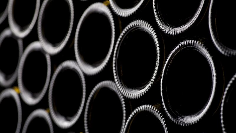 Why does a wine bottle have a dimple at the bottom? It might just be to make the bottle look as if it’s holding more wine than it actually is. Photograph: iStock/Getty