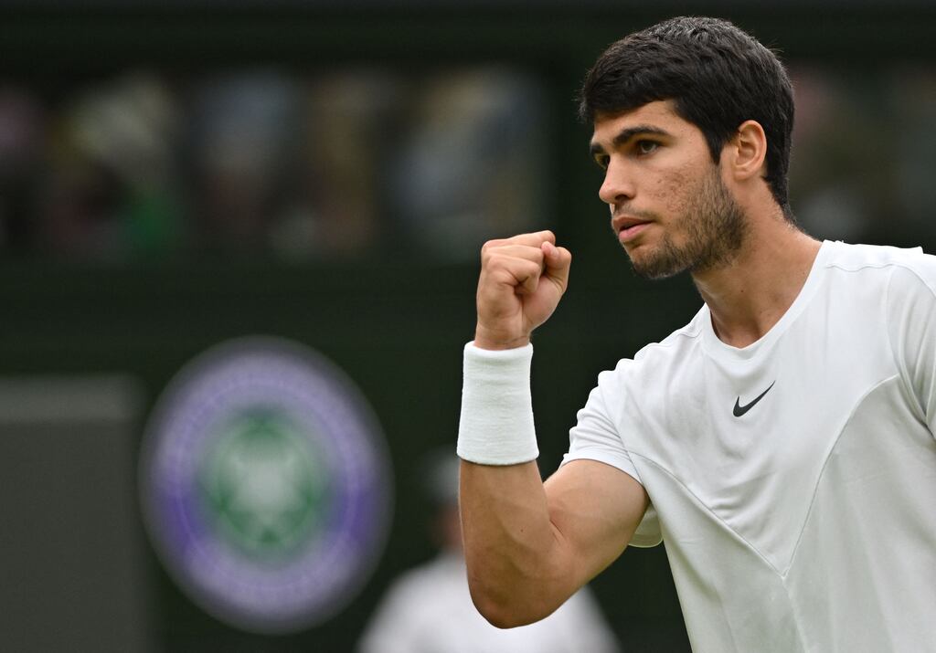 Spain's Carlos Alcaraz reacts as he plays Chile's Nicolas Jarry on Centre Court at Wimbledon. Photograph: Glyn Kirk/AFP via Getty
