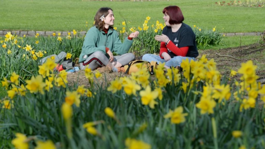 Zoe Weber Hall and Aoife Munro from Dublin enjoy the mild spring weather in Dublin’s Merrion Square. Photograph: Alan Betson/The Irish Times