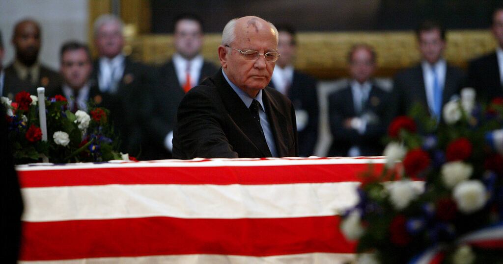Former Soviet leader Mikhail Gorbachev at the coffin of former US president Ronald Reagan in Washington in 2004. Gorbachev has died in Moscow aged 91. Photograph: Doug Mills/The New York Times