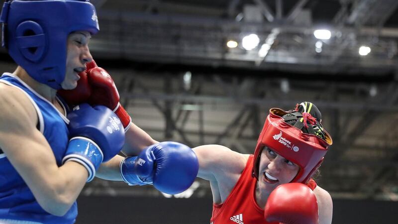 Ireland’s Michaela Walsh (right) in action against  Bulgaria’s Stanimira Petrova during the  women’s featherweight final at the European games in Minsk. Photograph:  Martin Rickett/PA Wire