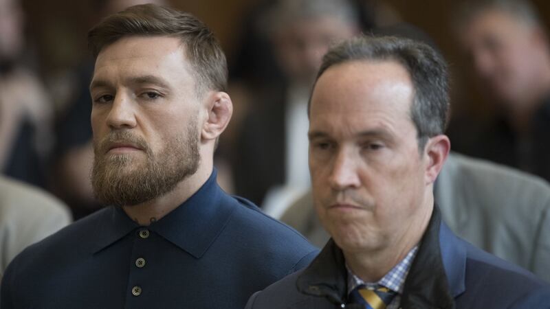 Conor McGregor stands with his lawyer Jim Walden during an arraignment in Brooklyn Criminal court. Photograph: Mary Altaffer/Getty Images