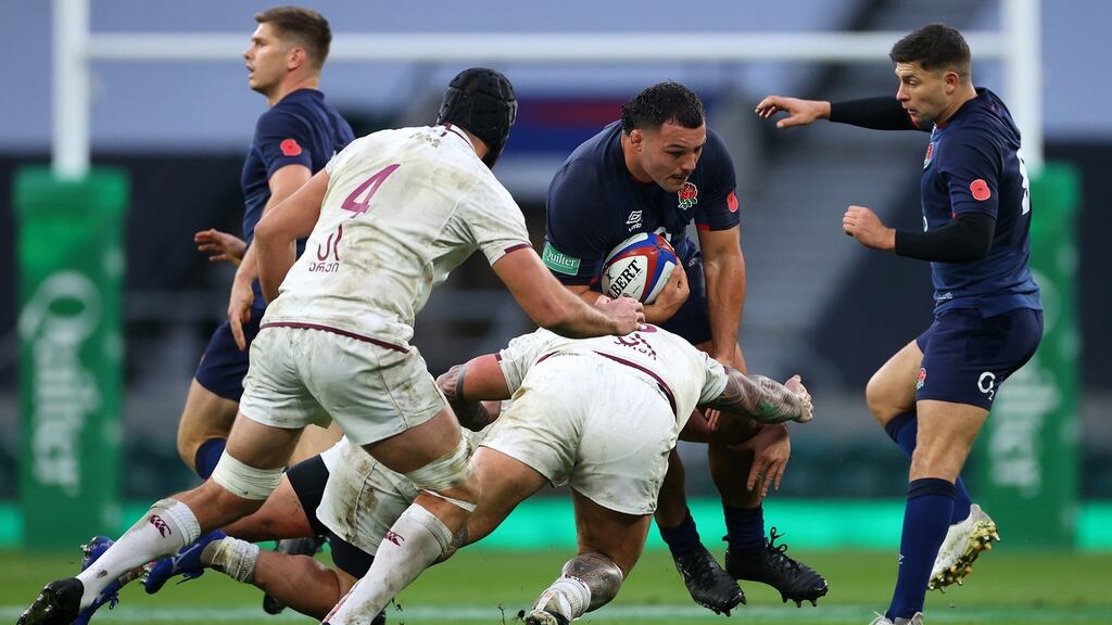 England’s Ellis Genge is tackled by Grigol Kerdikoshvili of Georgia during their international at Twickenham. Richard Heathcote/Getty Images