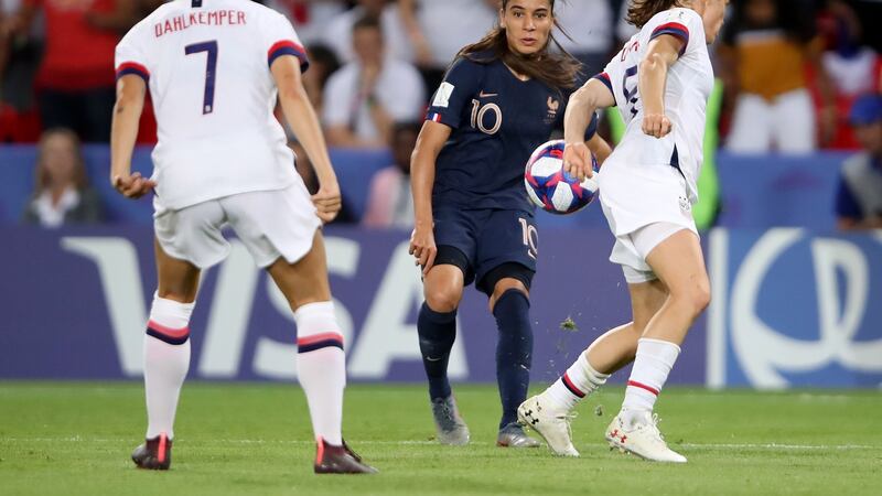 Kelley O’Hara appears to handle Amel Majri’s cross during the USA’s win over hosts France. Photograph: Alex Grimm/Getty