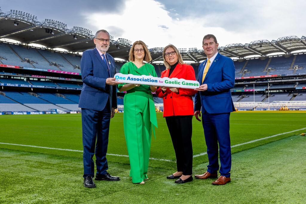 GAA president Larry McCarthy, Camogie Association president Hilda Breslin, Mary McAleese, and Mícheál Naughton, LGFA president, at Croke Park on Tuesday. Photograph: ©INPHO/Morgan Treacy