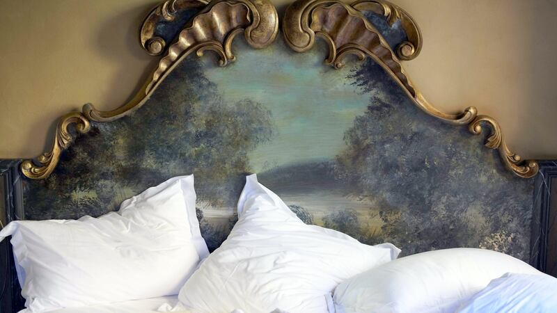 A bedroom at the hotel Cour des Loges.