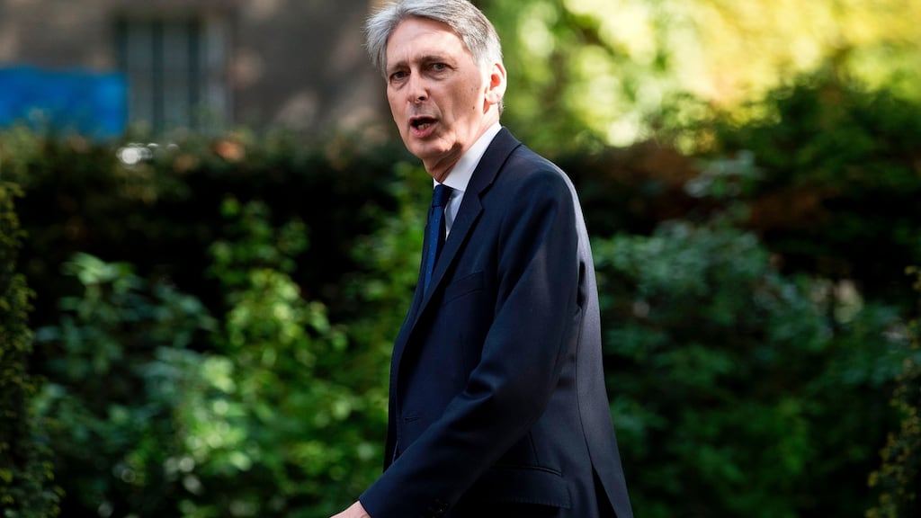 Britain’s Chancellor of the Exchequer Philip Hammond reacts as he walks in Downing Street in central London . Photograph: Justin Tallis/ Getty